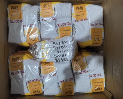 custom socks packed with medium bags to save plastic