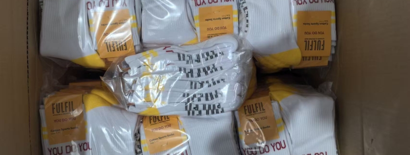 custom socks packed with medium bags to save plastic