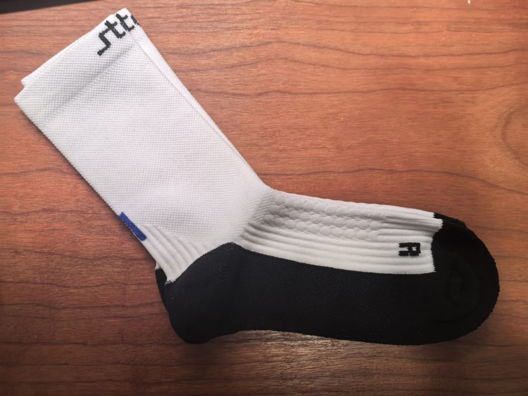 Custom sports sock with random paddings and achilles ergonomic ribbing