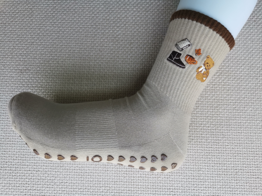 Large logo embroidery logo on socks big coverage, weared on foot model